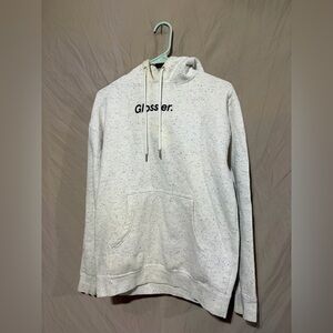 Glossier sweatshirt.